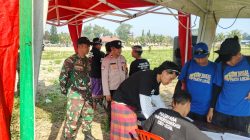 Bhabin Desa Bongan Hadiri dan Amankan Pembukaan Lomba Layang layang di Subak Layah wanasara