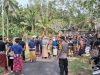 Bhabinkamtibmas Desa Batuaji Bersama Pecalang Kawal Prosesi Ngaben Warga di Desa Batuaji